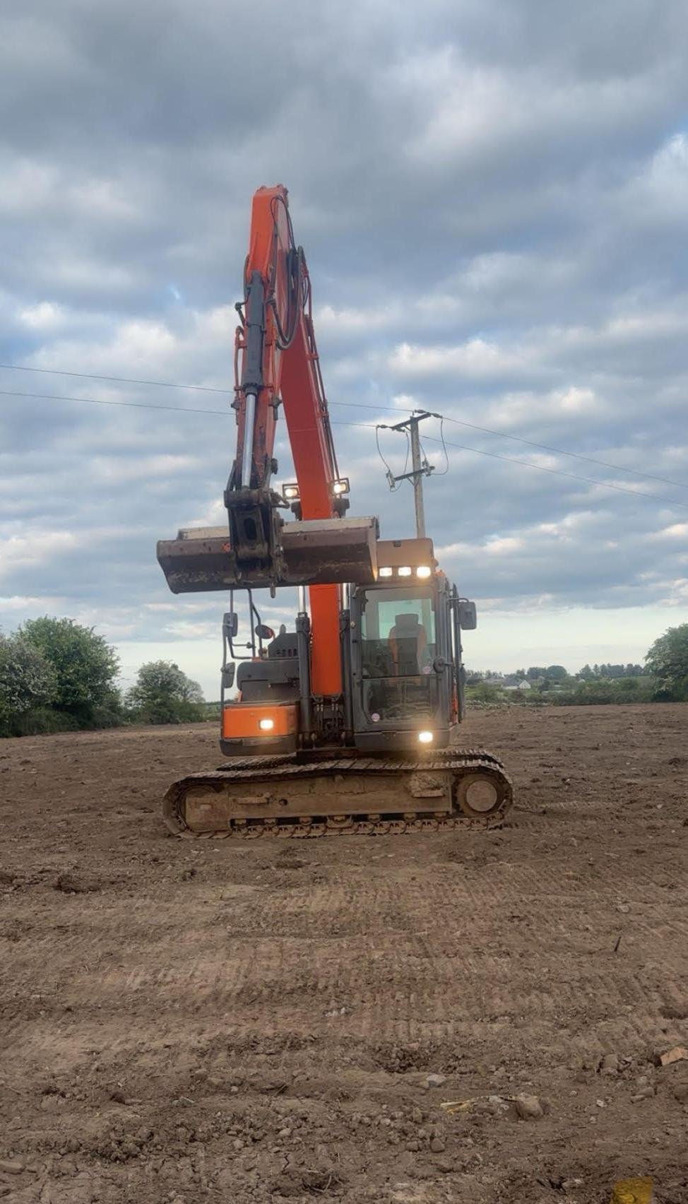 groundworks plant hire work in progress with digger landscaping to do